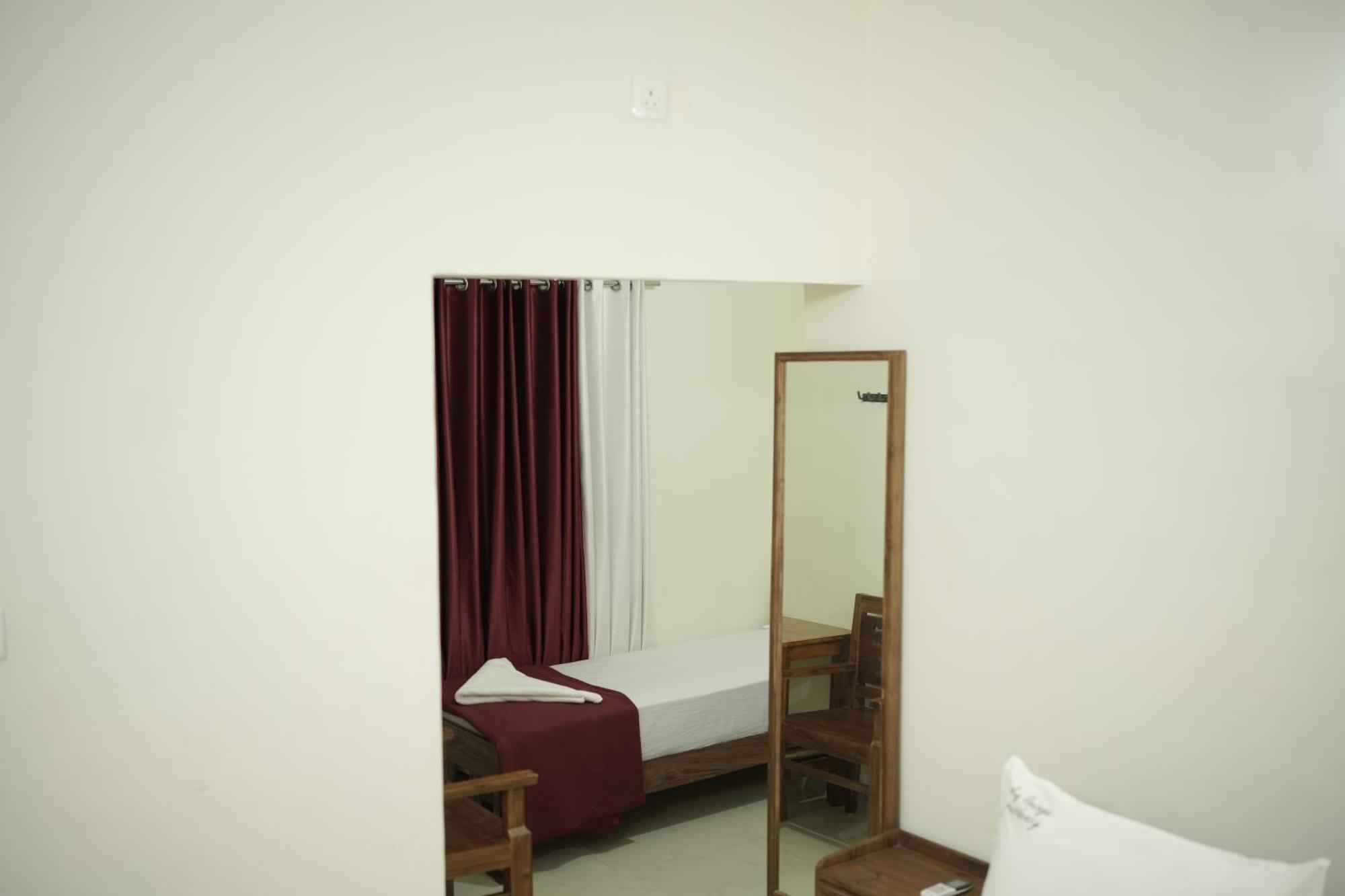 Appartement Skylounge Residency à Thiruvananthapuram Extérieur photo
