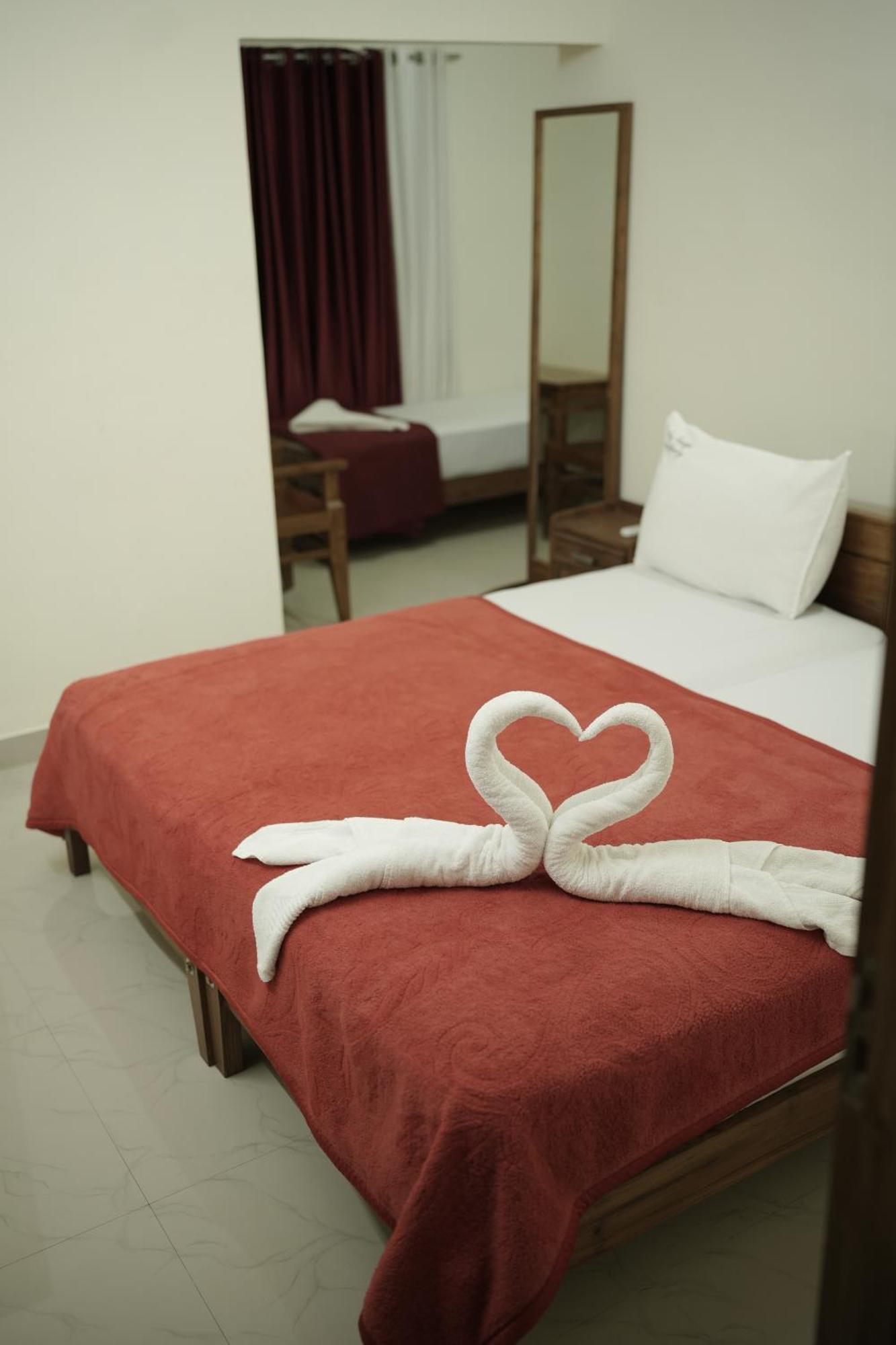 Appartement Skylounge Residency à Thiruvananthapuram Extérieur photo